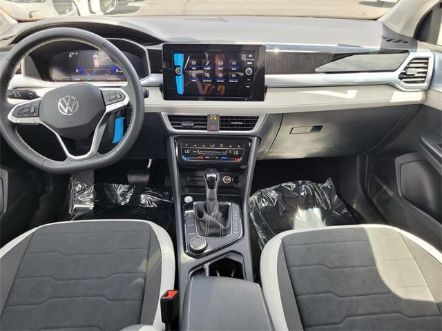 new 2025 Volkswagen Taos car, priced at $30,656