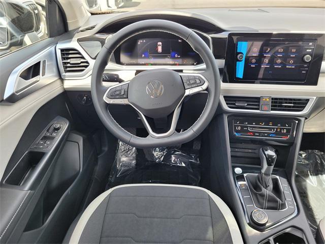 new 2025 Volkswagen Taos car, priced at $30,656