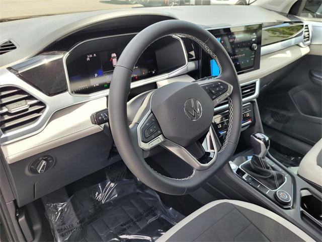 new 2025 Volkswagen Taos car, priced at $30,656