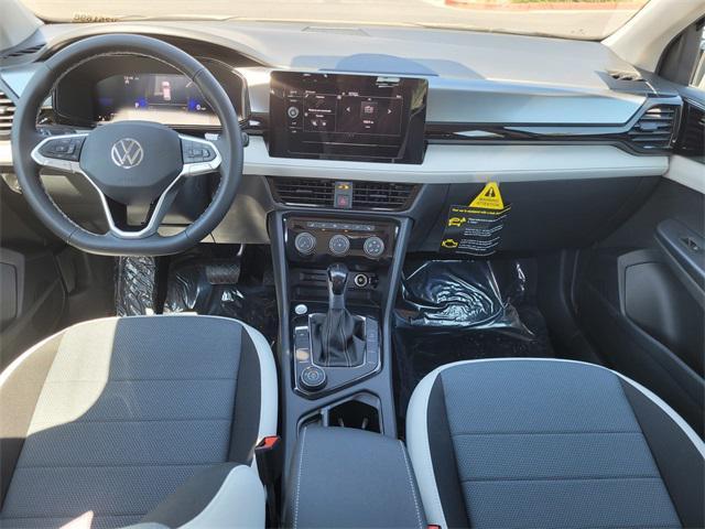 new 2025 Volkswagen Taos car, priced at $27,416