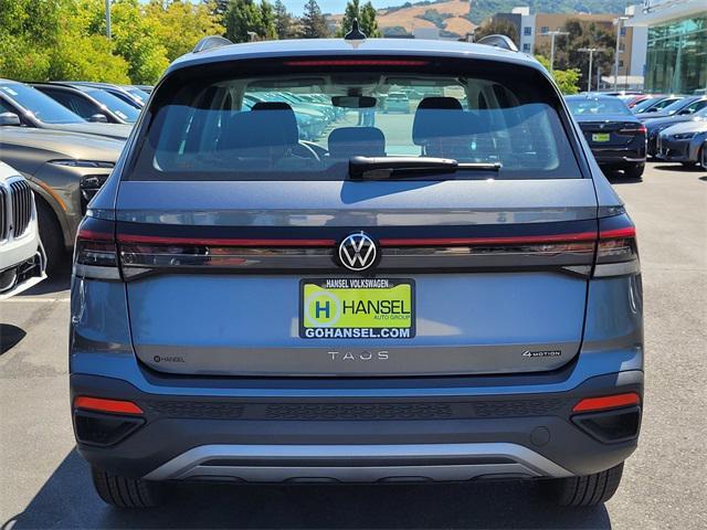 new 2025 Volkswagen Taos car, priced at $27,416