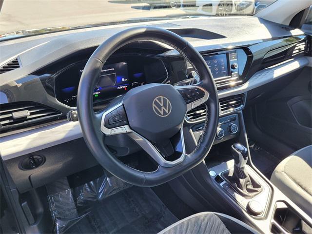 used 2022 Volkswagen Taos car, priced at $20,000