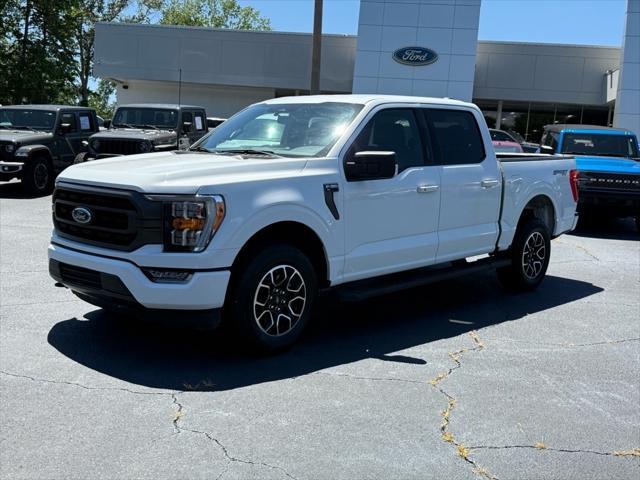 used 2023 Ford F-150 car, priced at $34,900