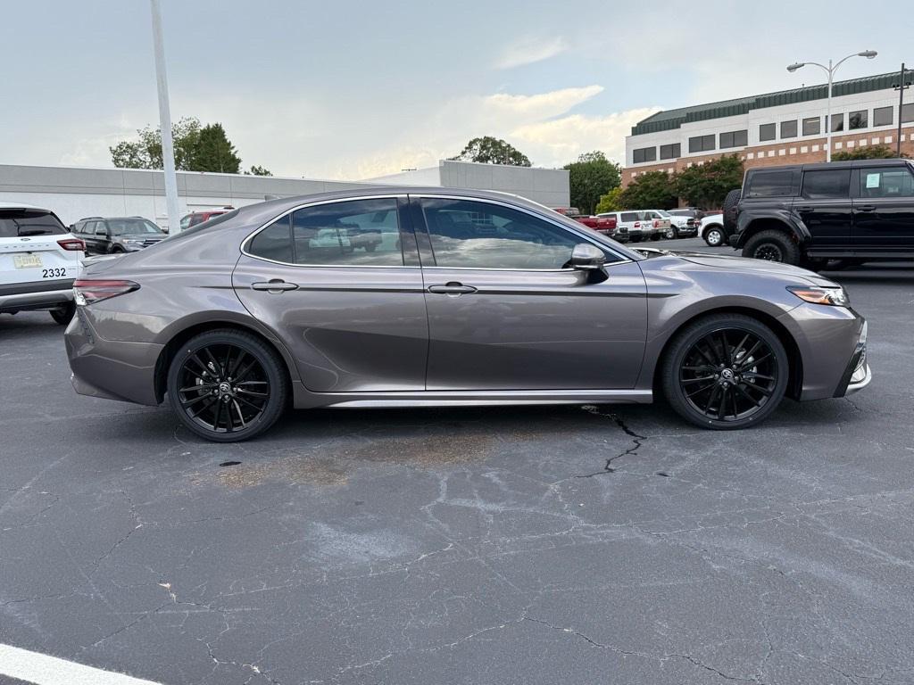 used 2024 Toyota Camry Hybrid car, priced at $31,294
