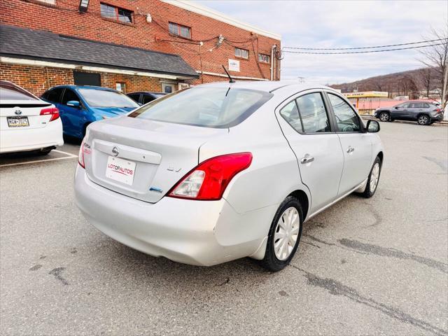 used 2012 Nissan Versa car, priced at $3,995