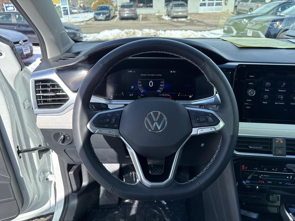 new 2025 Volkswagen Taos car, priced at $30,174