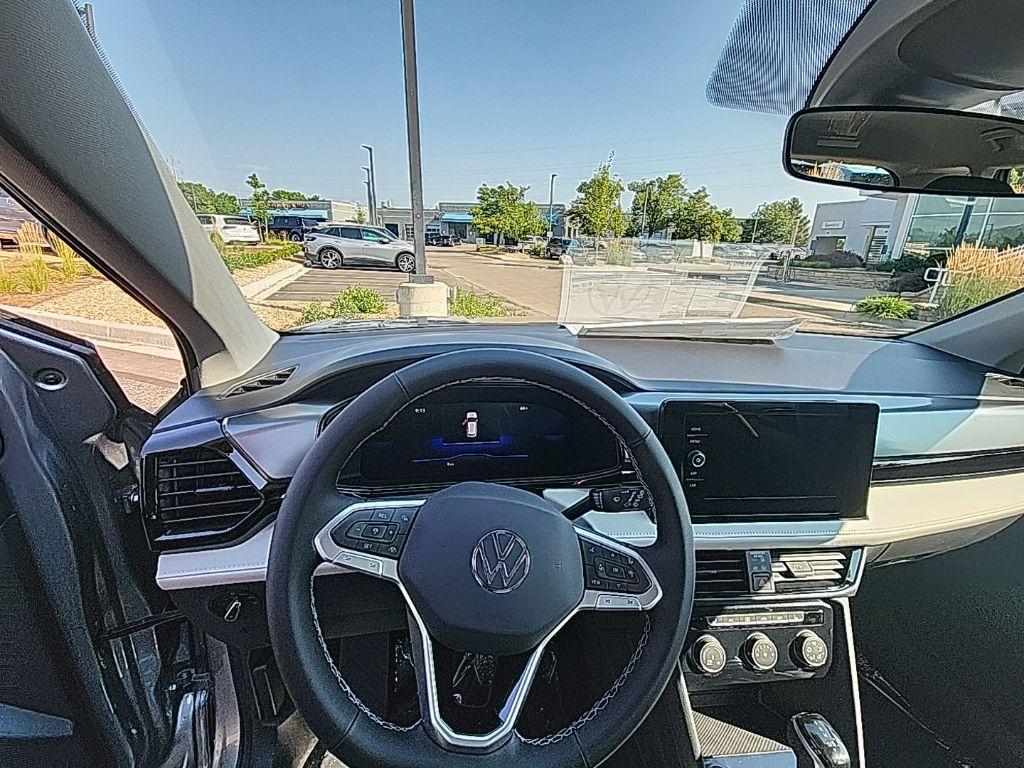 new 2025 Volkswagen Taos car, priced at $27,010