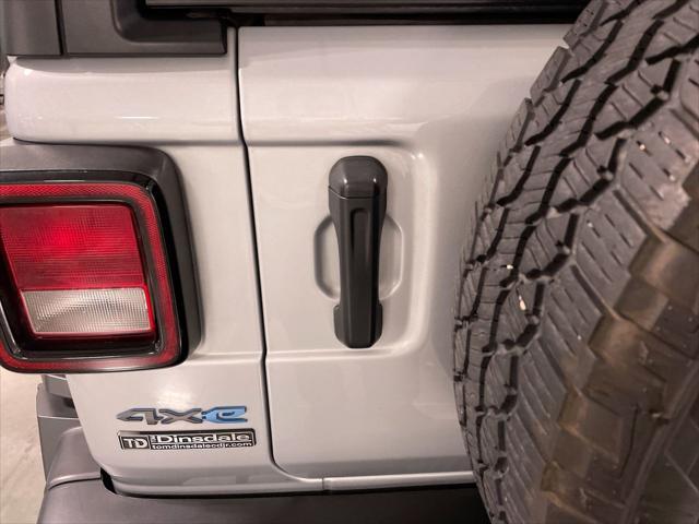used 2023 Jeep Wrangler 4xe car, priced at $33,540