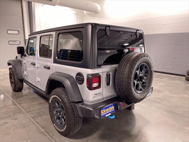 used 2023 Jeep Wrangler 4xe car, priced at $33,540