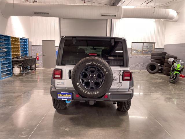 used 2023 Jeep Wrangler 4xe car, priced at $33,540