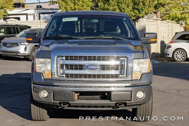 used 2013 Ford F-150 car, priced at $14,000