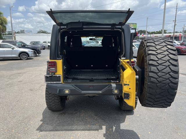 used 2015 Jeep Wrangler Unlimited car, priced at $14,749