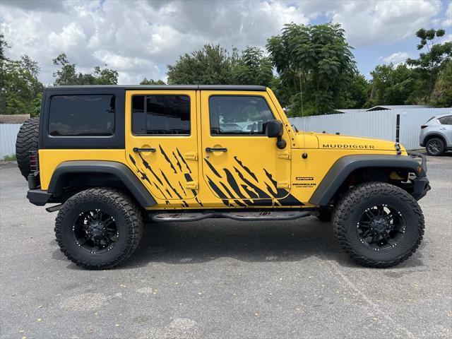 used 2015 Jeep Wrangler Unlimited car, priced at $14,749