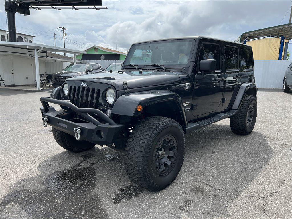 used 2015 Jeep Wrangler Unlimited car, priced at $15,829