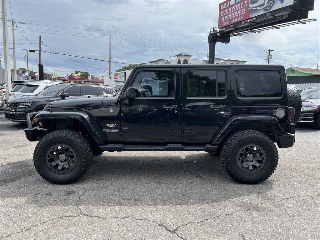 used 2015 Jeep Wrangler Unlimited car, priced at $15,829