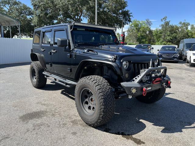 used 2012 Jeep Wrangler Unlimited car, priced at $13,999