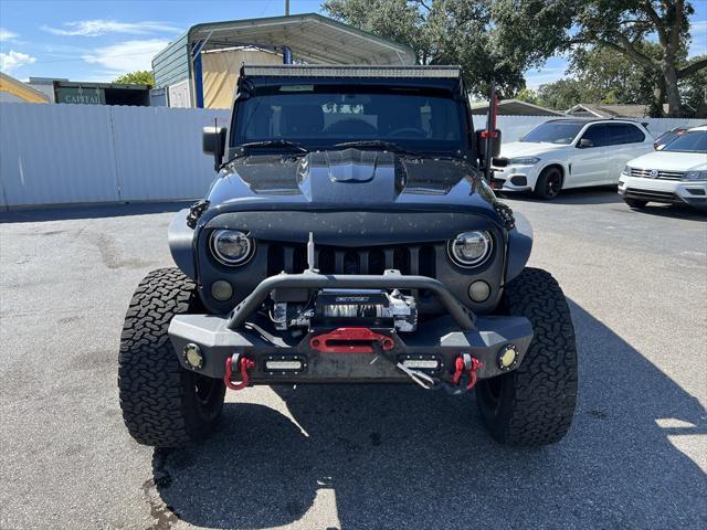 used 2012 Jeep Wrangler Unlimited car, priced at $13,999