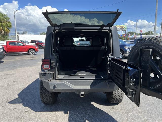 used 2012 Jeep Wrangler Unlimited car, priced at $13,999