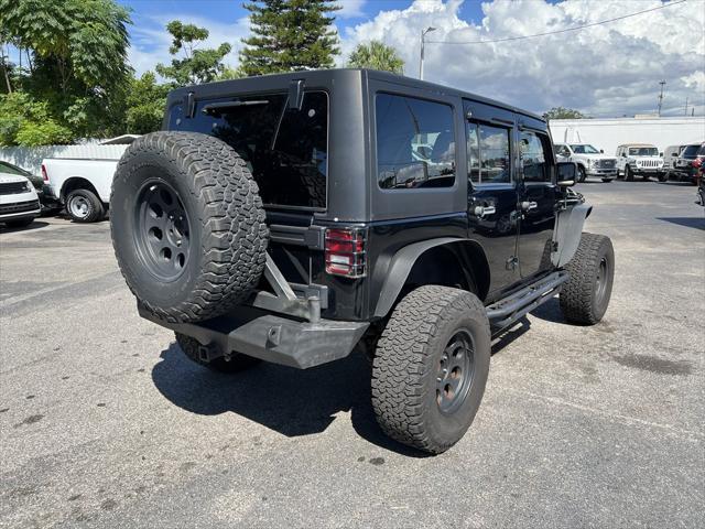 used 2012 Jeep Wrangler Unlimited car, priced at $13,999