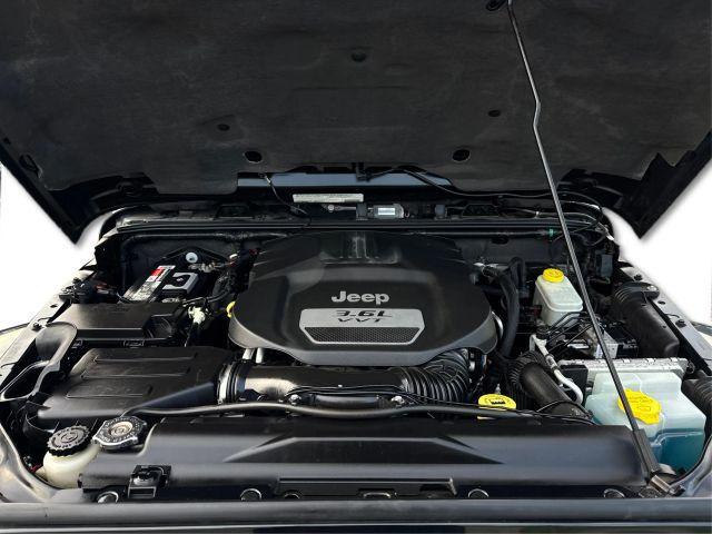 used 2012 Jeep Wrangler Unlimited car, priced at $12,995