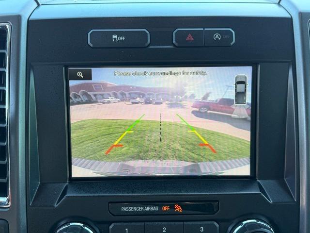 used 2015 Ford F-150 car, priced at $14,000