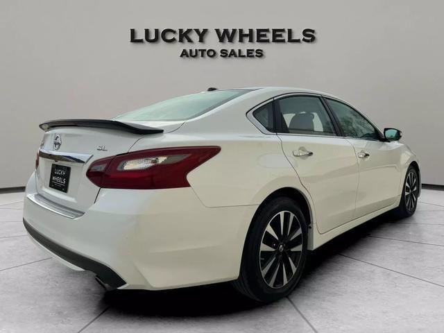 used 2018 Nissan Altima car, priced at $14,995