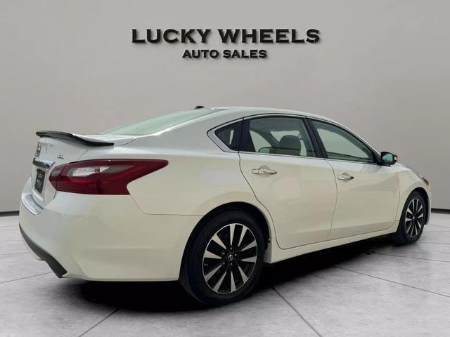 used 2018 Nissan Altima car, priced at $14,995