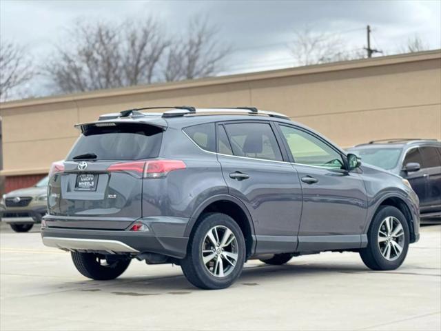 used 2018 Toyota RAV4 car, priced at $17,995
