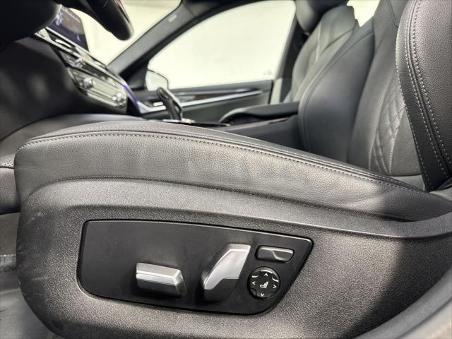 used 2023 BMW 530e car, priced at $30,298