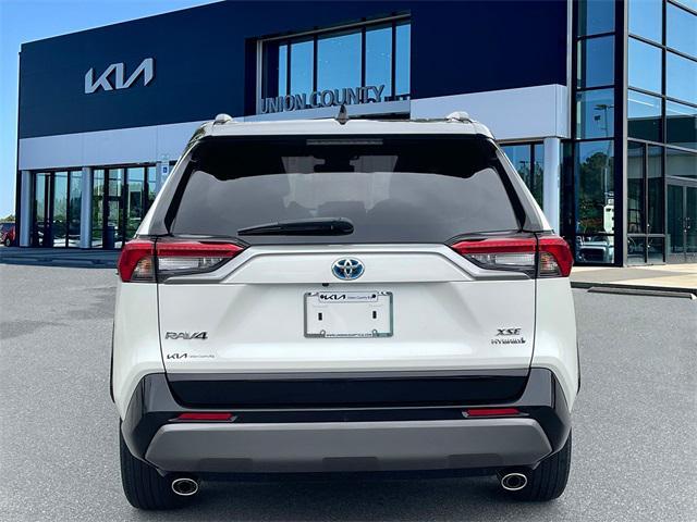 used 2021 Toyota RAV4 Hybrid car, priced at $30,488