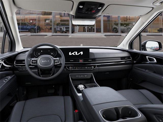 new 2025 Kia Carnival Hybrid car, priced at $53,054