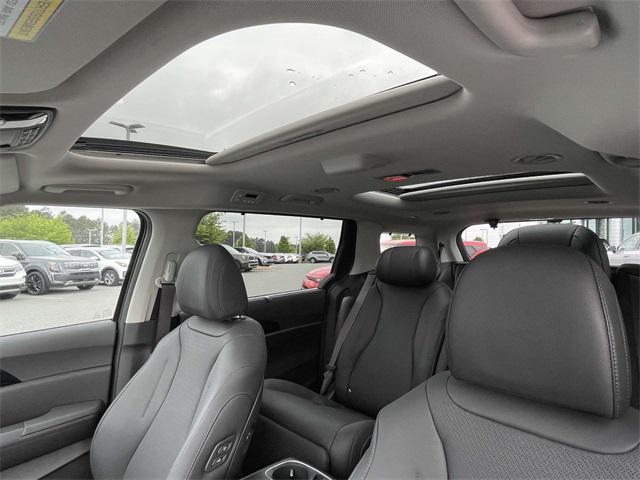 new 2025 Kia Carnival Hybrid car, priced at $53,054