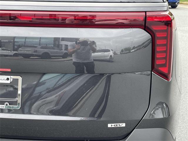 new 2025 Kia Carnival Hybrid car, priced at $53,054