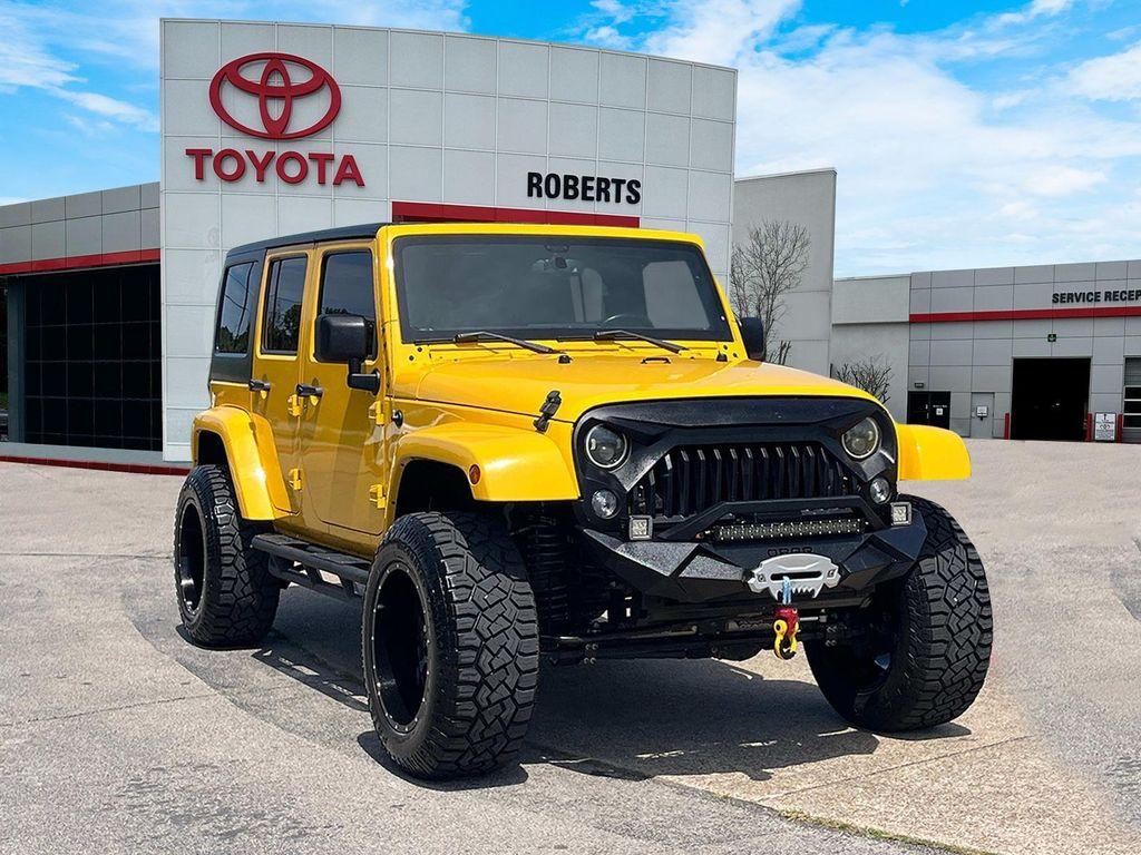 used 2015 Jeep Wrangler Unlimited car, priced at $18,399