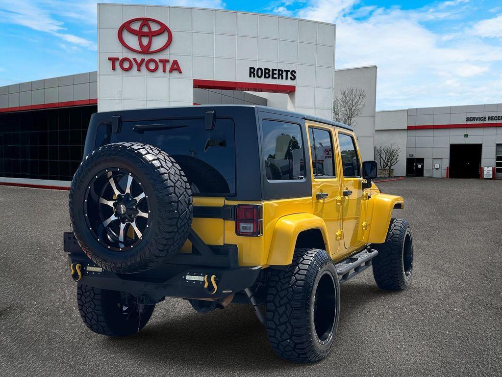 used 2015 Jeep Wrangler Unlimited car, priced at $19,499