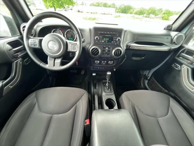 used 2014 Jeep Wrangler Unlimited car, priced at $17,204