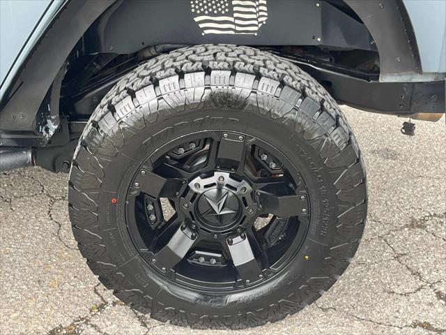 used 2014 Jeep Wrangler Unlimited car, priced at $17,204
