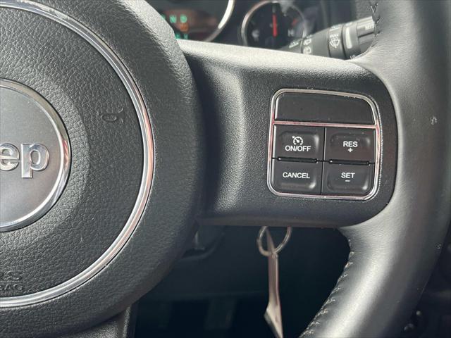 used 2014 Jeep Wrangler Unlimited car, priced at $17,204