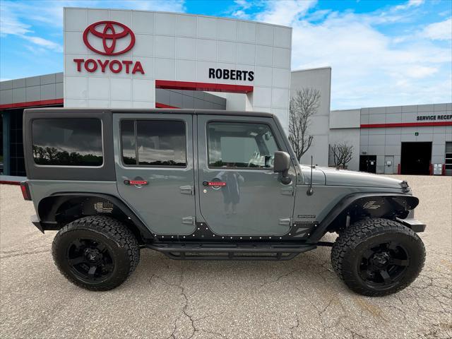 used 2014 Jeep Wrangler Unlimited car, priced at $17,204