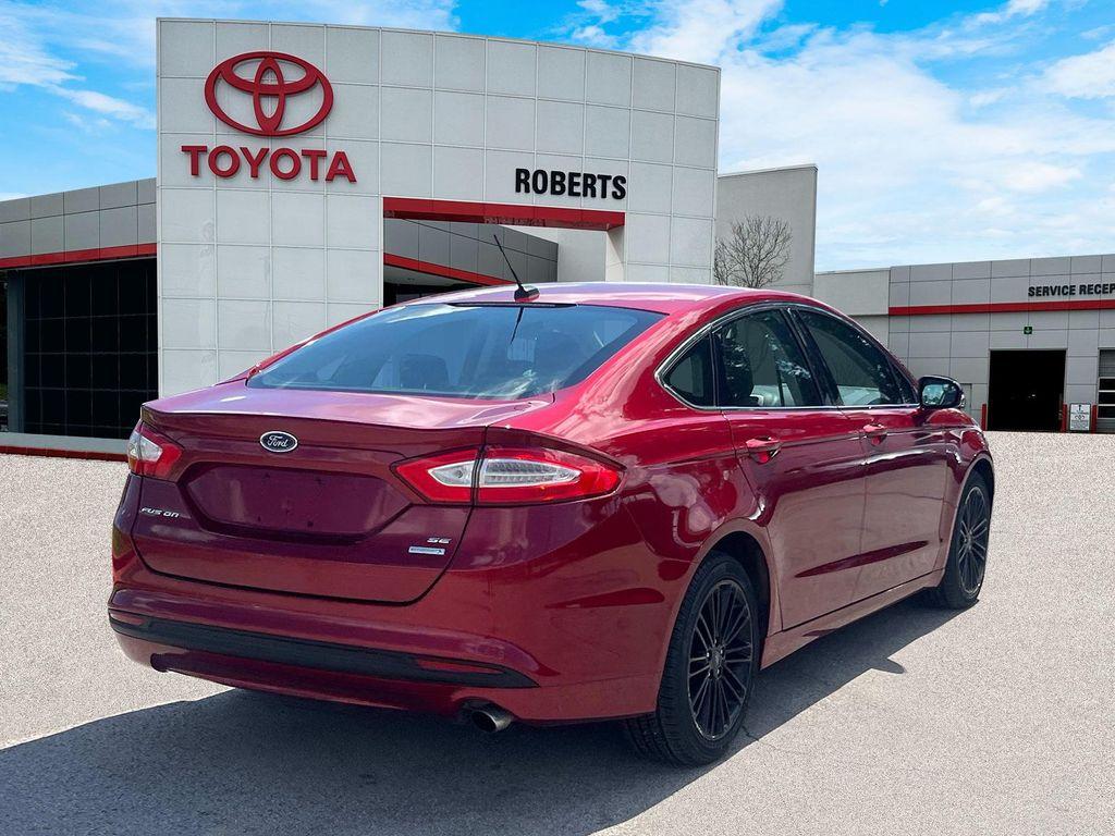 used 2014 Ford Fusion car, priced at $10,499