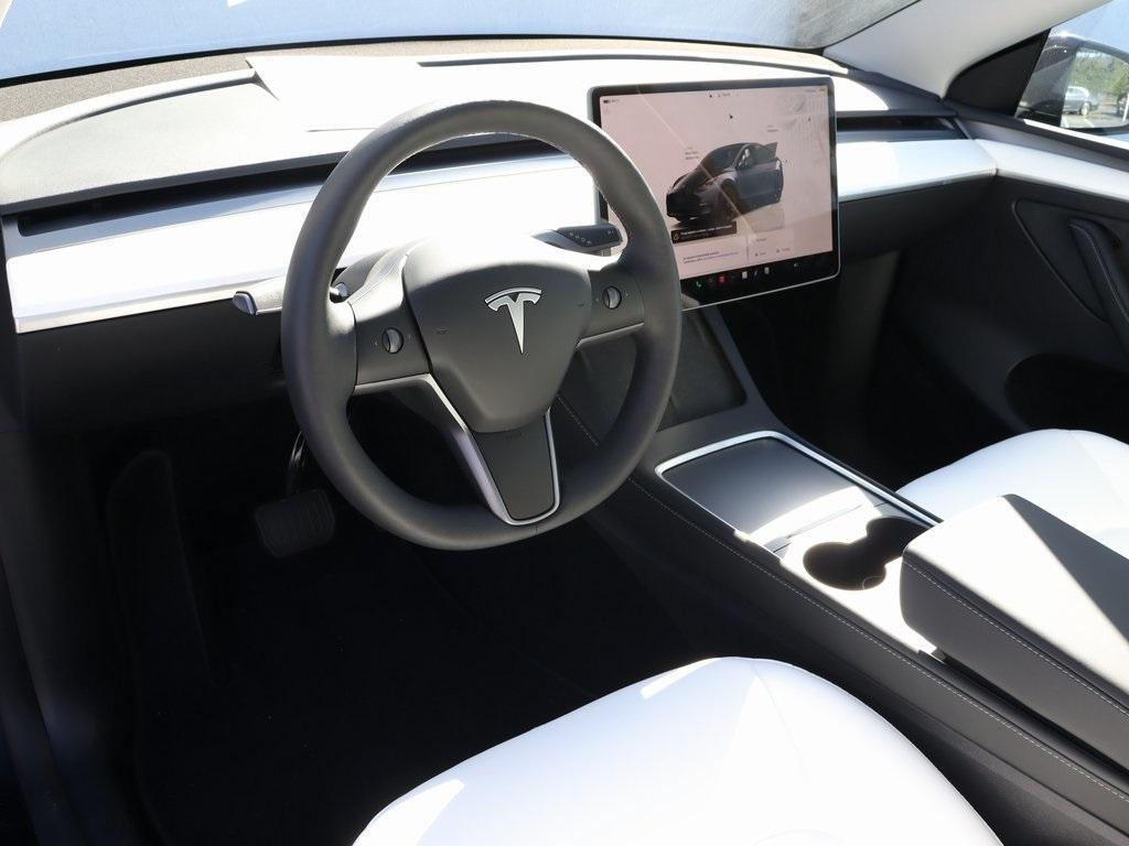 used 2024 Tesla Model Y car, priced at $42,990