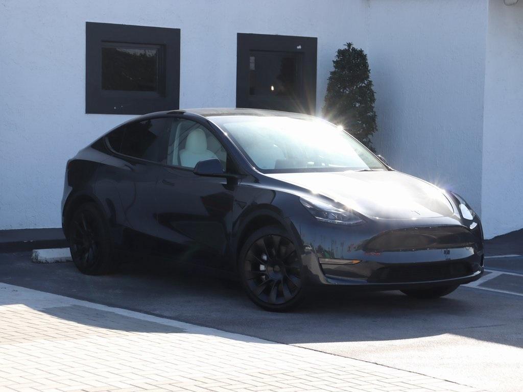 used 2024 Tesla Model Y car, priced at $42,990