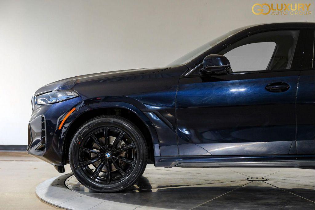 used 2025 BMW X6 car, priced at $54,995