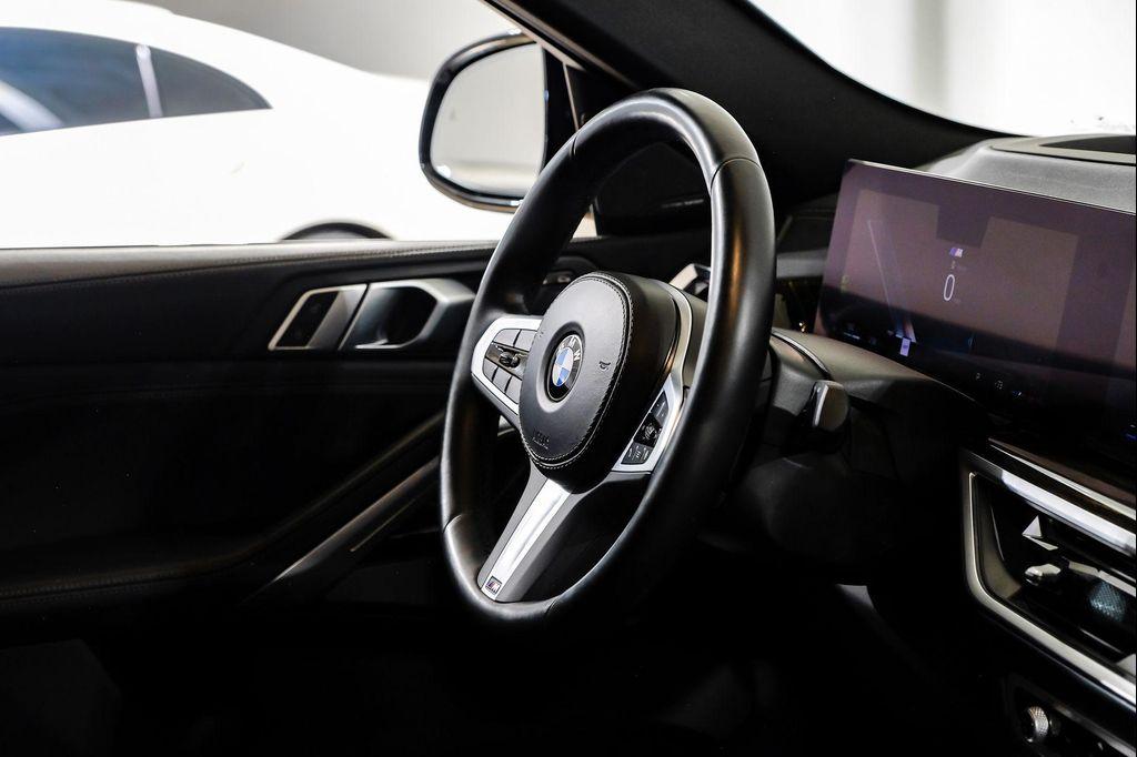 used 2025 BMW X6 car, priced at $54,995