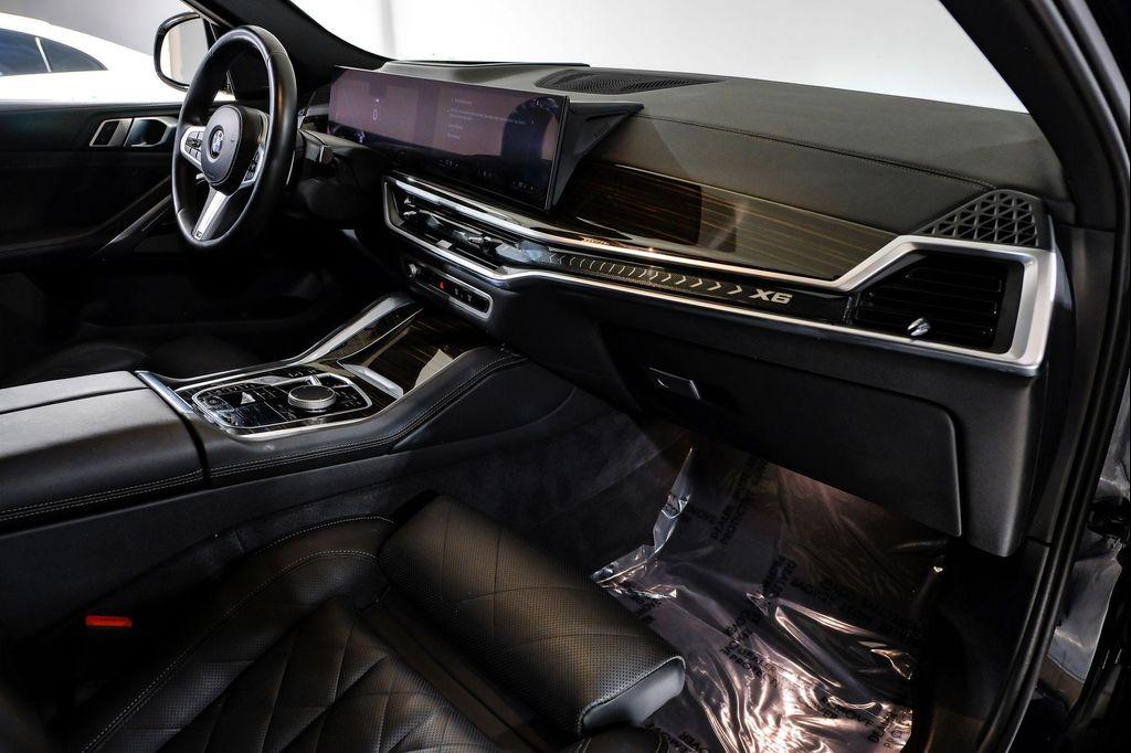 used 2025 BMW X6 car, priced at $54,995