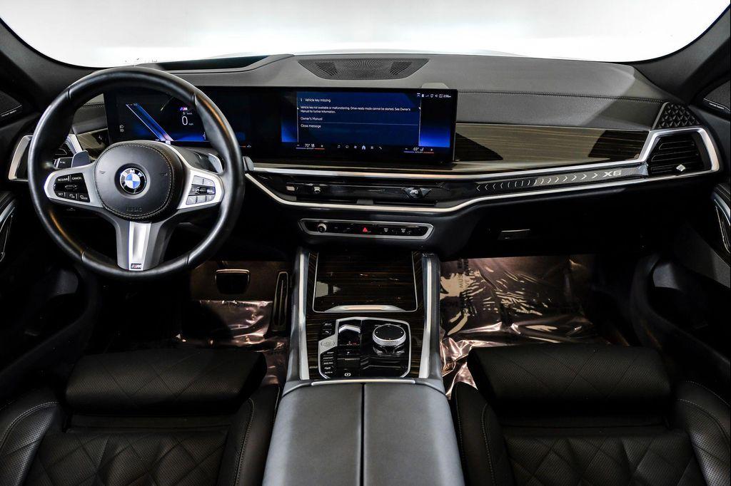 used 2025 BMW X6 car, priced at $54,995