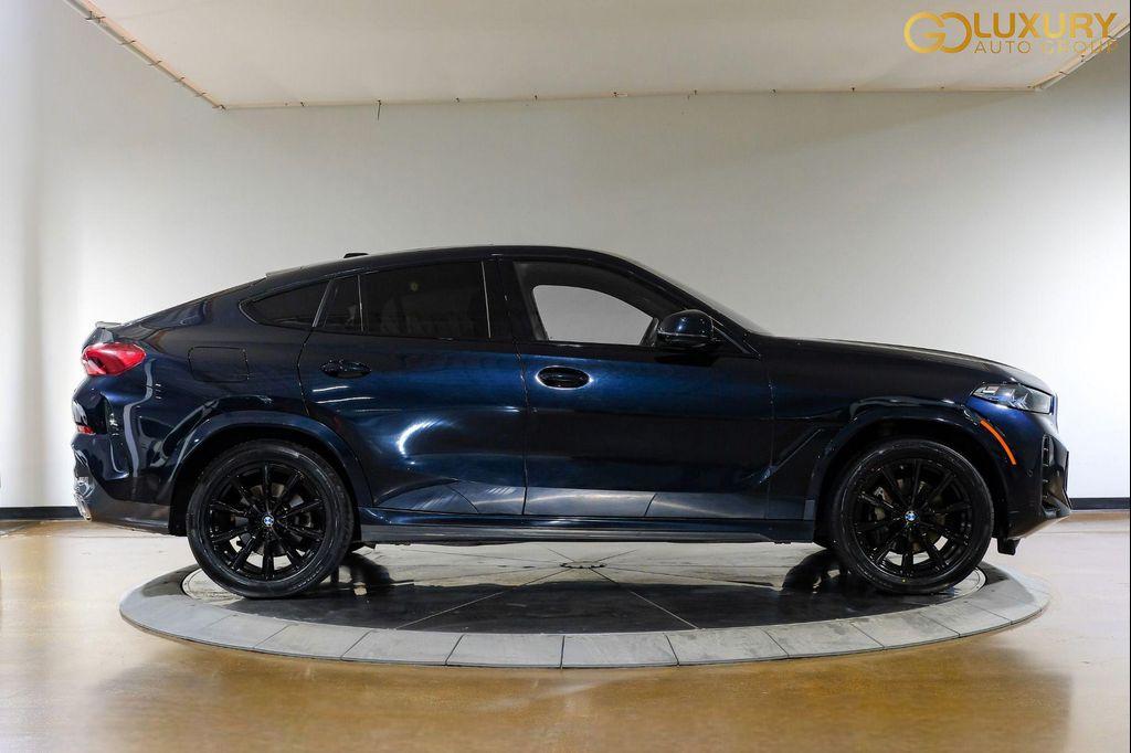 used 2025 BMW X6 car, priced at $54,995