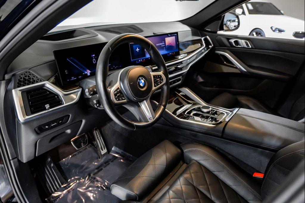 used 2025 BMW X6 car, priced at $54,995