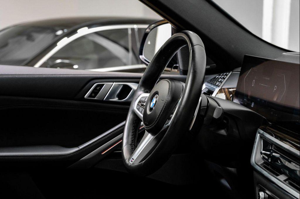 used 2025 BMW X6 car, priced at $54,995