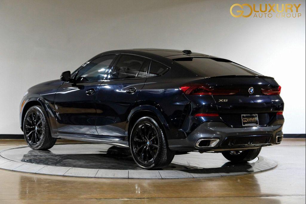 used 2025 BMW X6 car, priced at $54,995